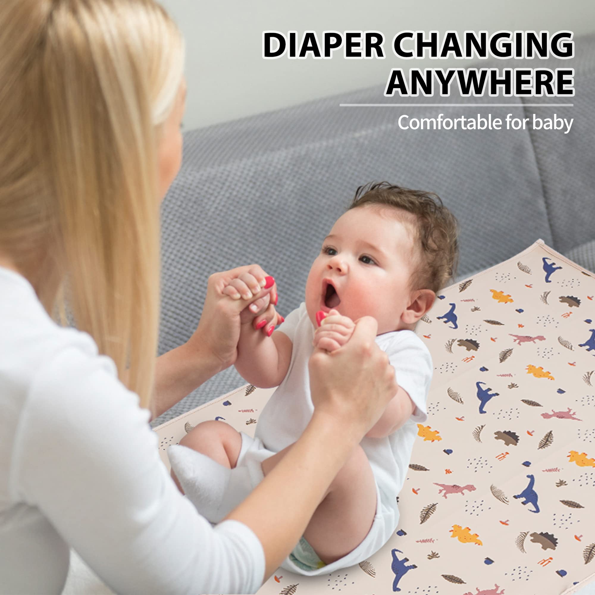 PHOEBUS BABY dinosaur-pattern cover adds cute, modern style to diaper changes.