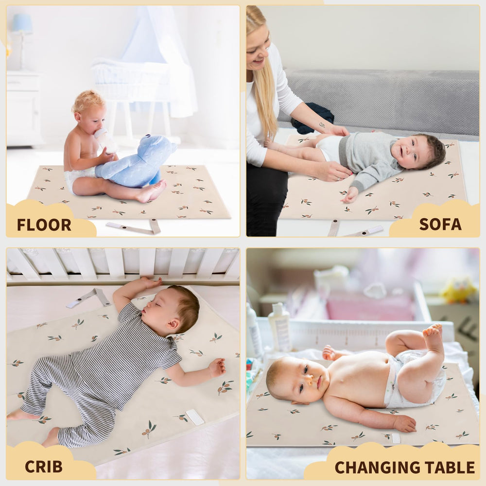 PHOEBUS BABY olive-branch pattern pad adds stylish nursery touch.