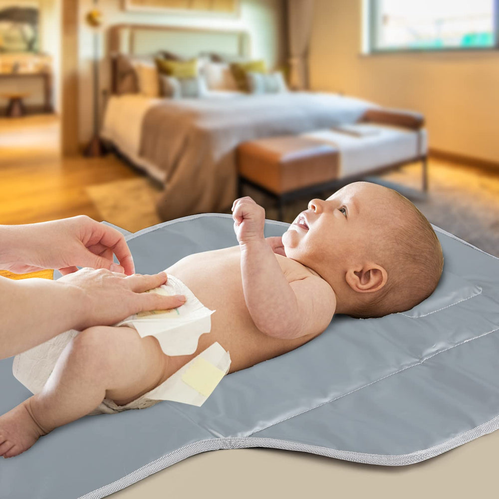PHOEBUS BABY on-the-go-mom-essentials captures a mess-free diaper change option.