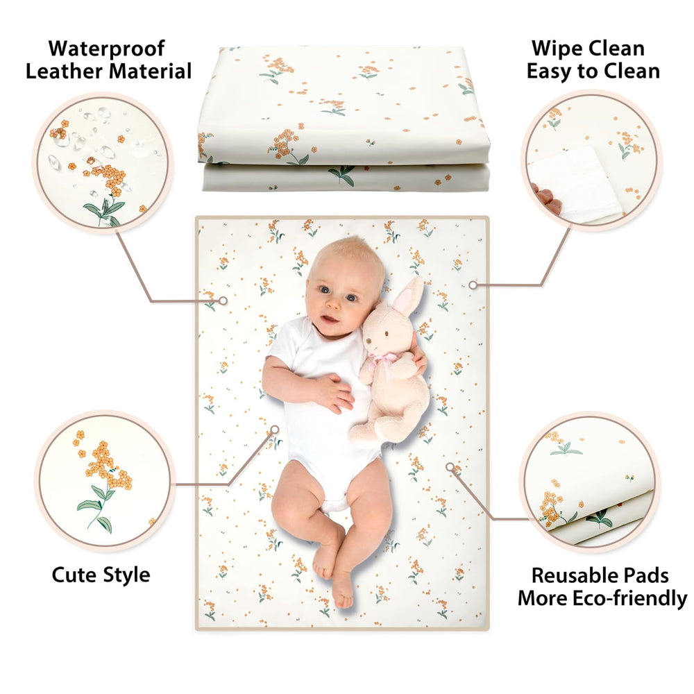 Phoebus Baby orange floral changing mat spread flat for safe diaper changes.