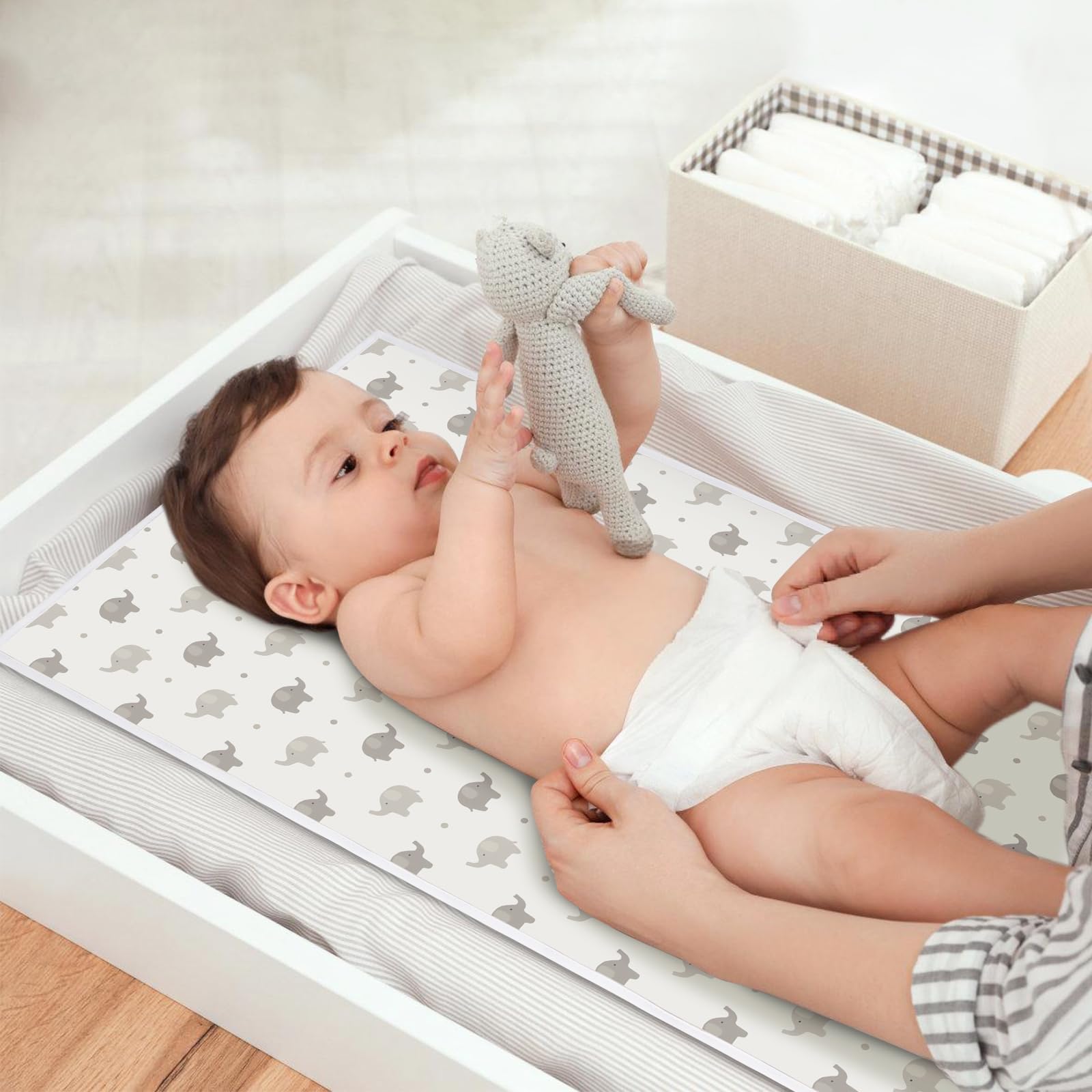 PHOEBUS BABY rainbow-elephant pattern adds cheerful vibe to nursery.
