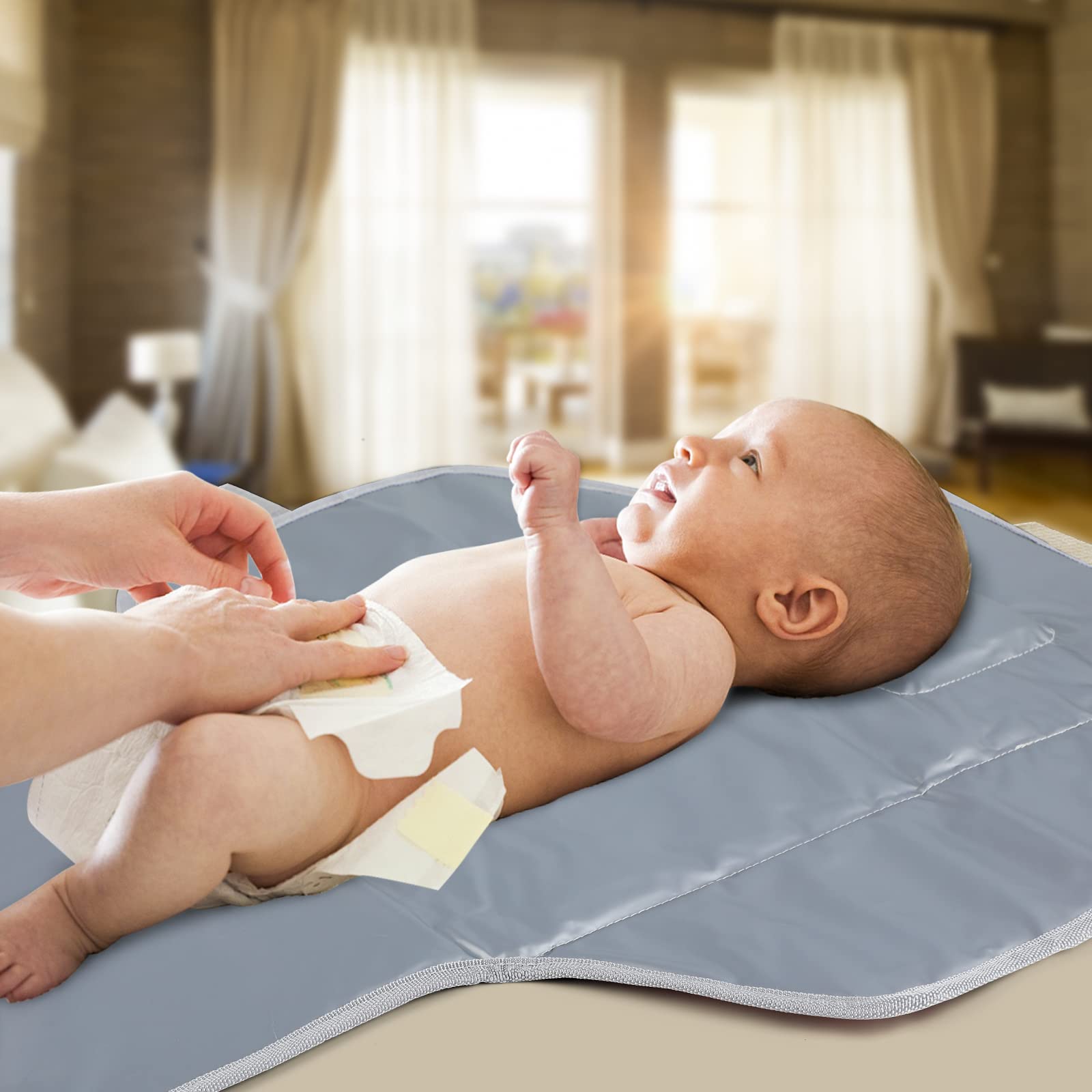 PHOEBUS BABY portable-changing-pad pink design adds cheerful style at parks.