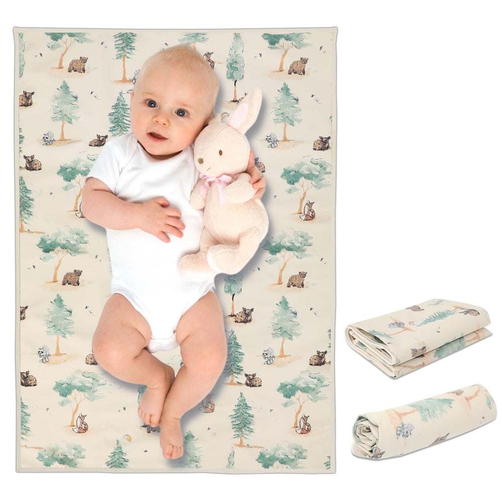 PHOEBUS BABY vegan leather changing mat forest close-up shows quick-clean waterproof surface.