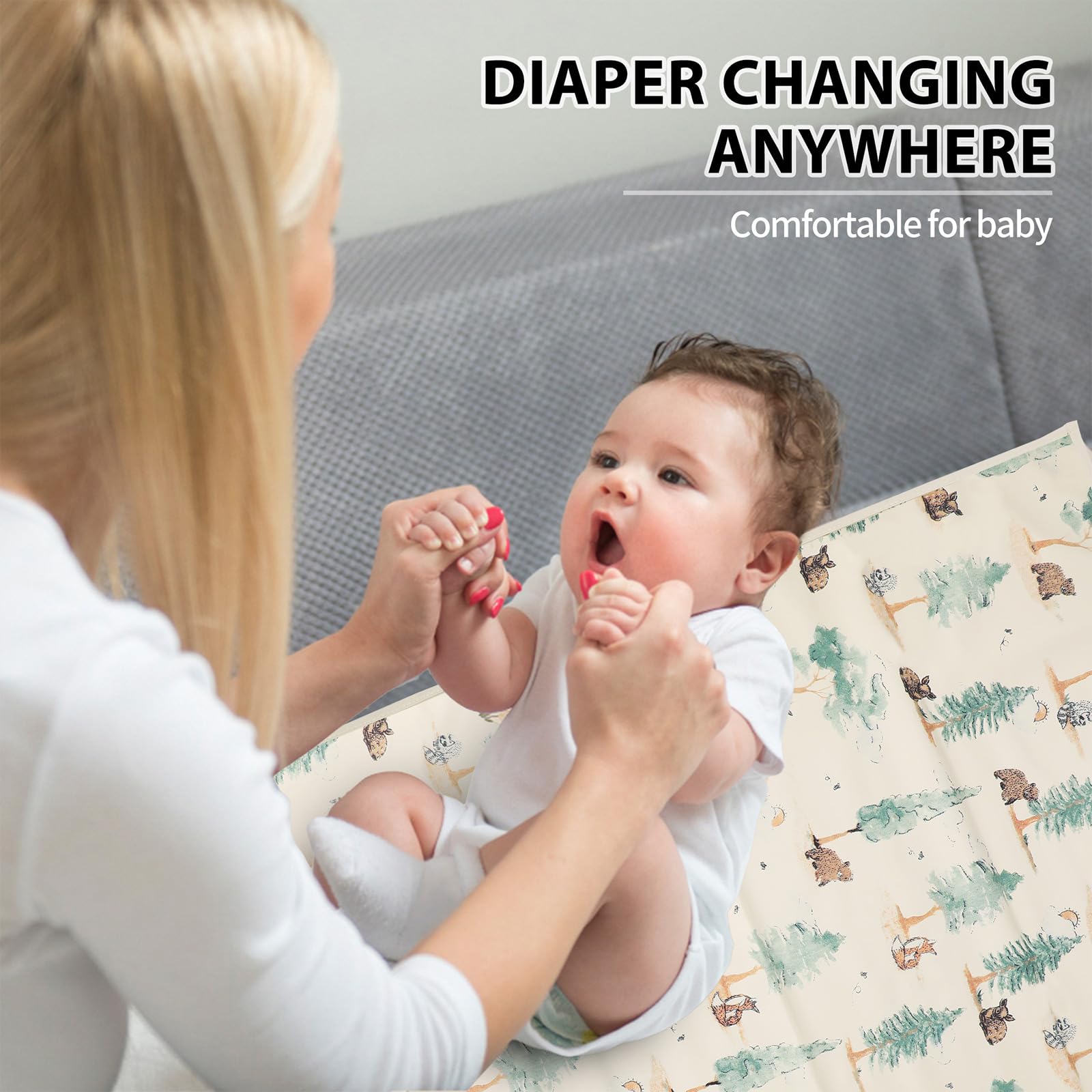 PHOEBUS BABY forest changing mat open-packaging display.