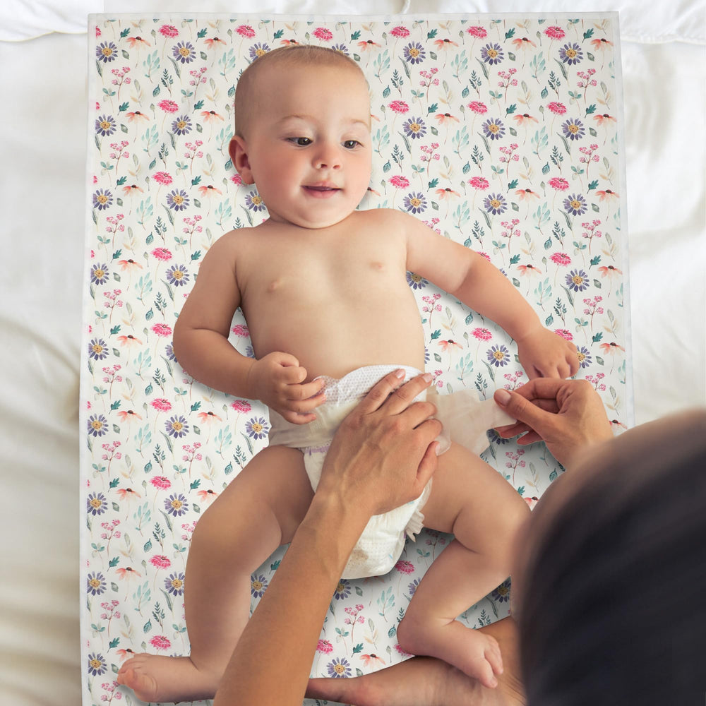 PHOEBUS BABY vegan leather wipe-clean material ensures fast cleanup after messy changes.