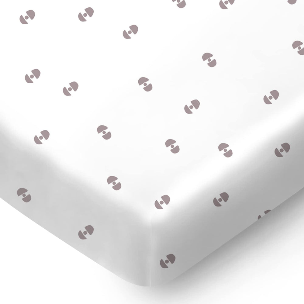 Pickle & Pumpkin mini crib sheet geometric pattern for cozy nap times.