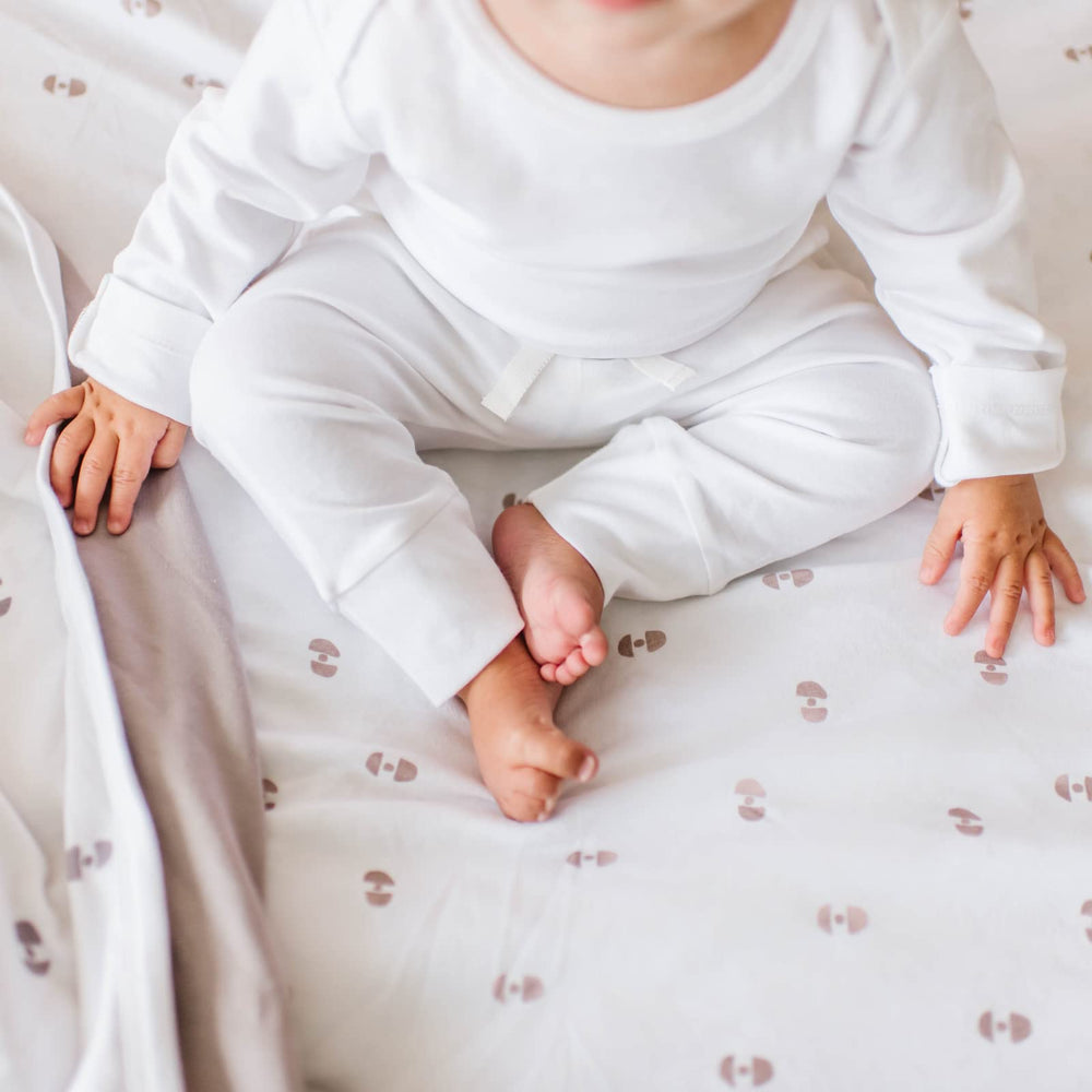 Pickle & Pumpkin vibrant prints spark curiosity during nap and play.