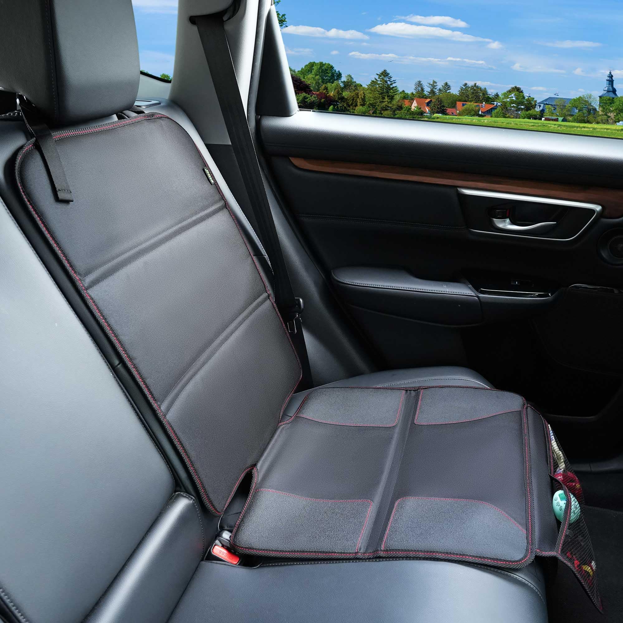 PIDO car seat protector non-slip backing keeps protector in place on busy roads.