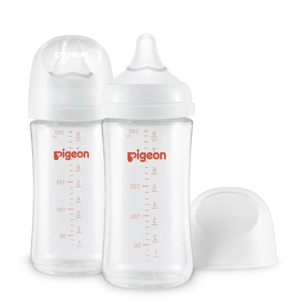 Pigeon glass nursing bottle wide neck improves grip and cleaning ease.