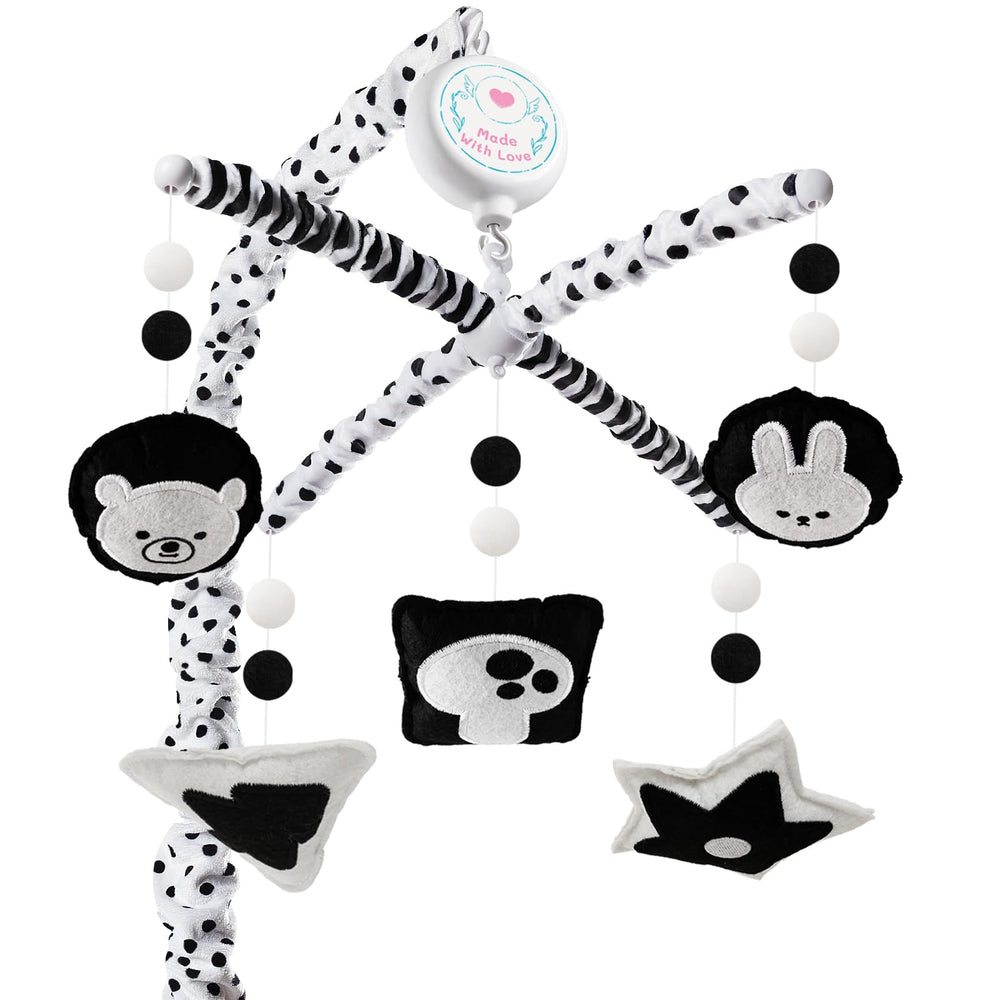 PIIKAGO Montessori mobile with black-and-white dots promotes visual tracking in crib.