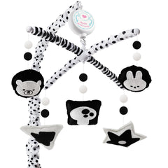 PIIKAGO Montessori mobile with black-and-white dots promotes visual tracking in crib.