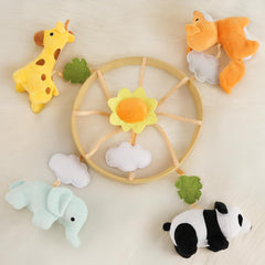 PIIKAGO Animals crib mobile fox plush toy offers rotating motion for bedtime calm.