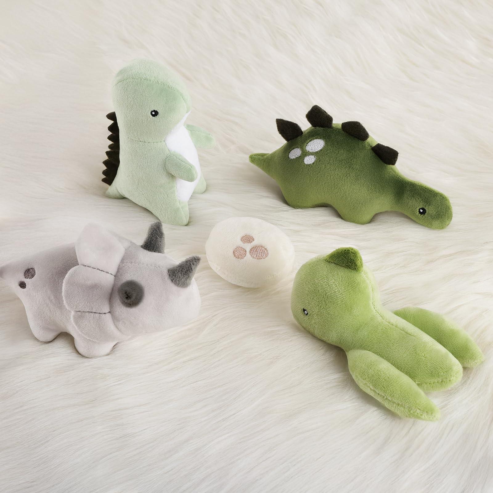 PIIKAGO Dinosaur Crib Mobile with a 3-mode music box for soothing routines.