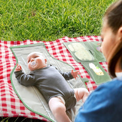 Pillani portable changing pad folded into a clutch for on-the-go storage