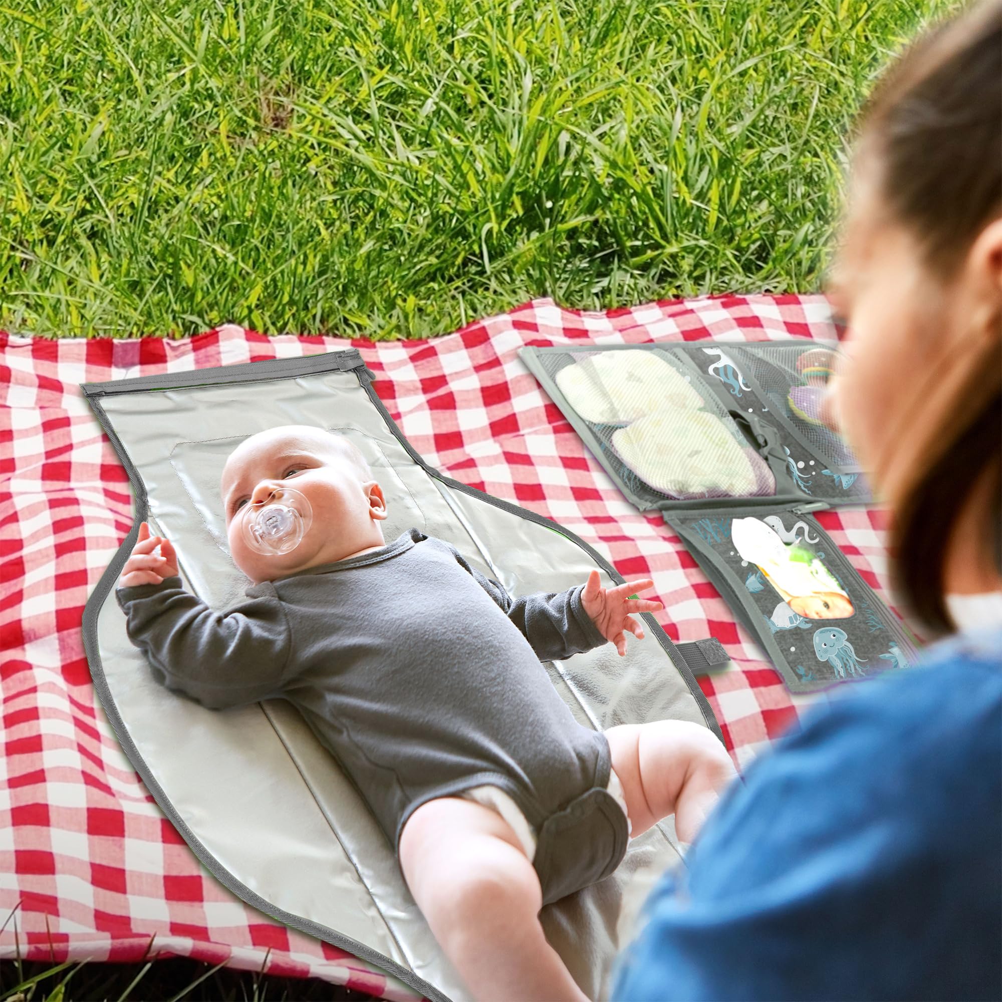 Pillani portable changing pad open layout, provides quick diaper access on outings.