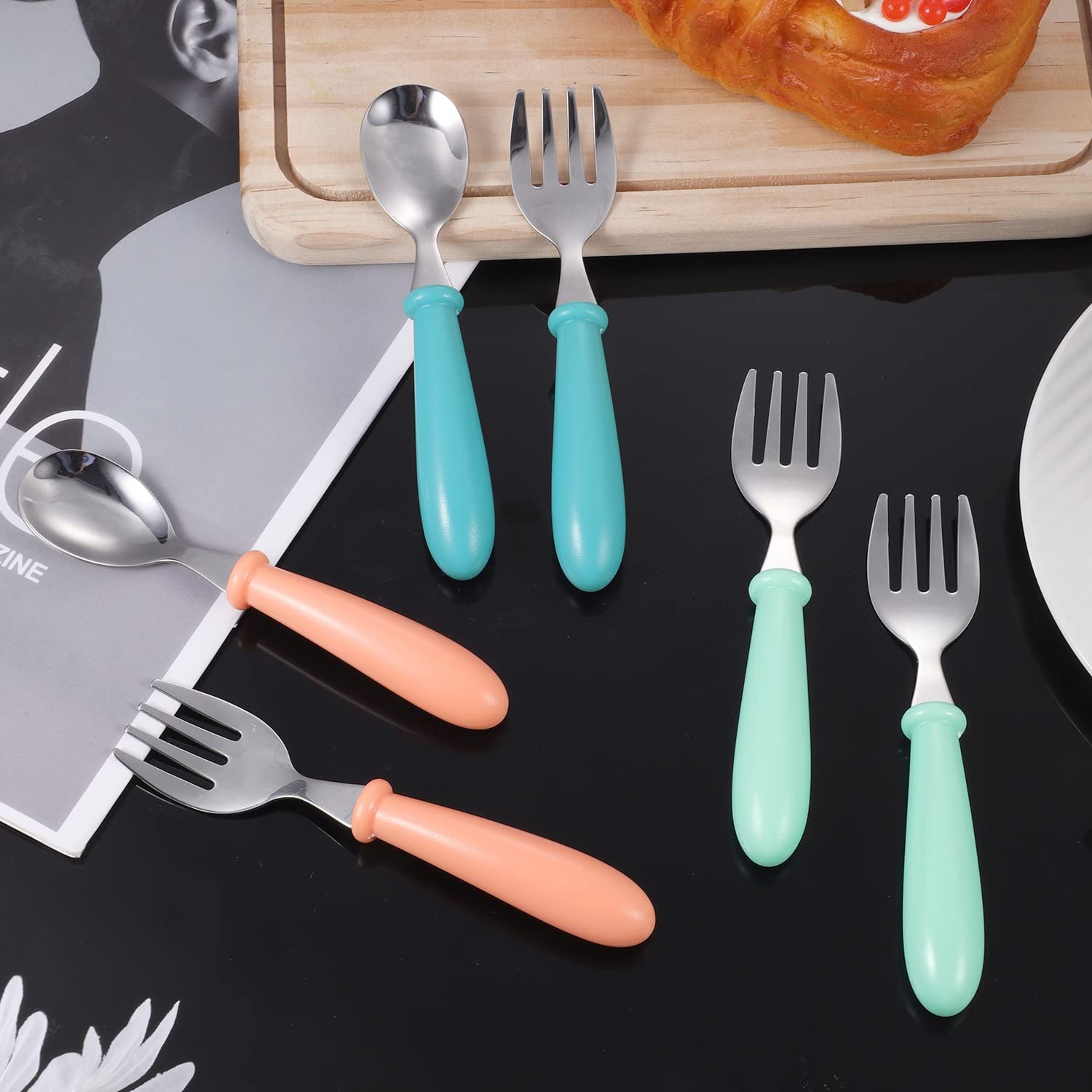 Pimoys glass-green toddler utensils for colorful, kid-friendly mealtimes and travel.