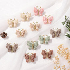 Pinkoriart handmade butterfly hair clip, detailed craftsmanship.