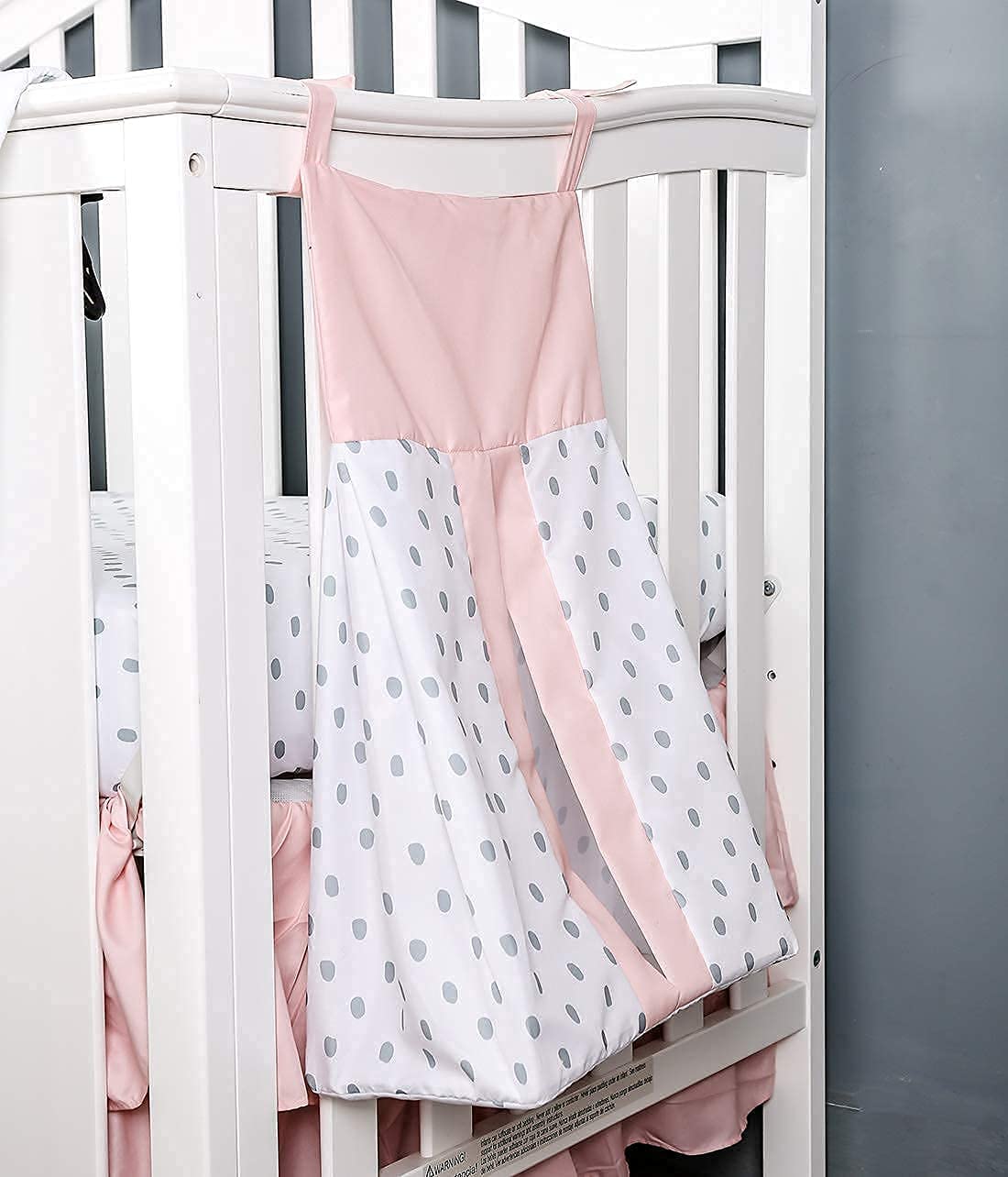 PINNKKU floral diaper stacker organizes essentials within easy reach.