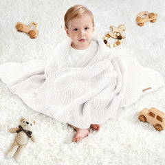 Pinuotu wave-pattern detail blanket highlights elegant nursery style and breathability