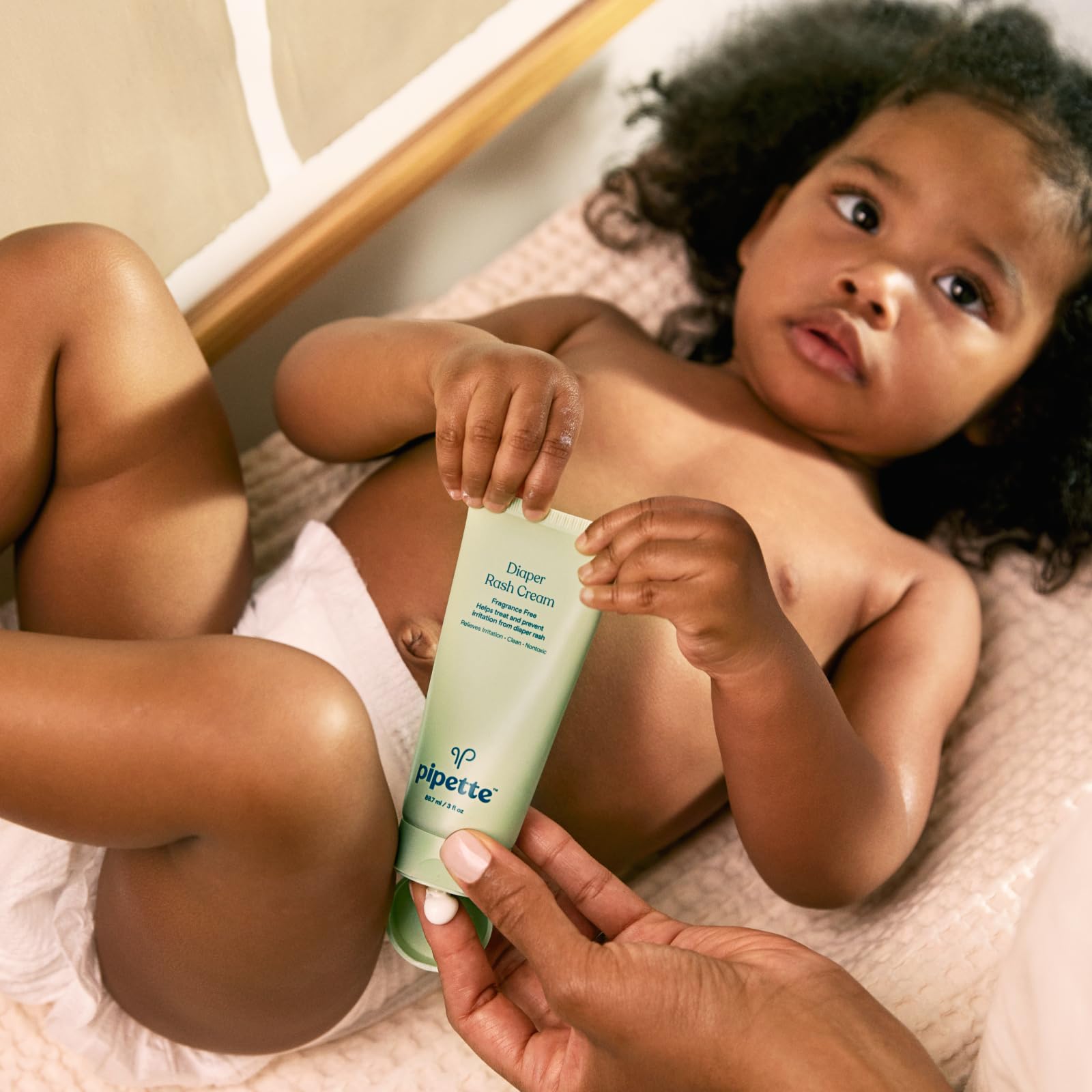 Pipette Diaper Rash Cream swirl on skin shows easy glide and moisturizer.