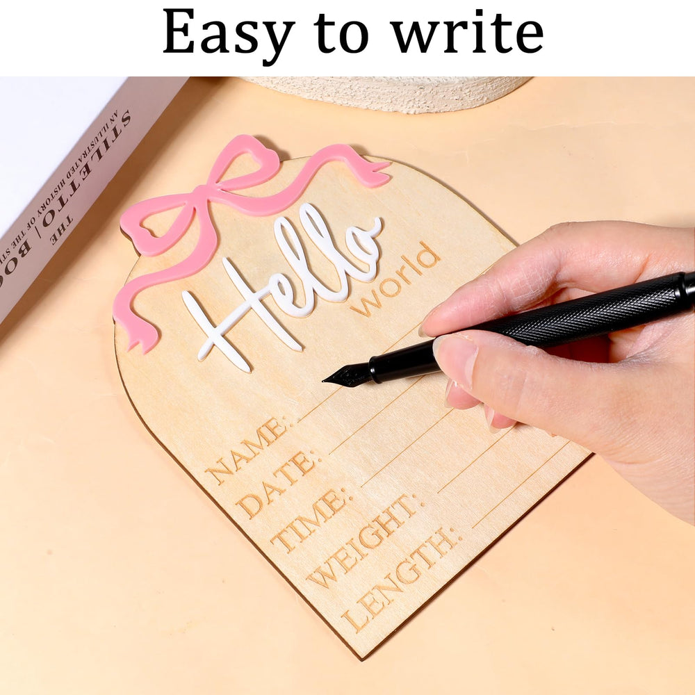 Piriuuo pink and white sign complements nursery color scheme