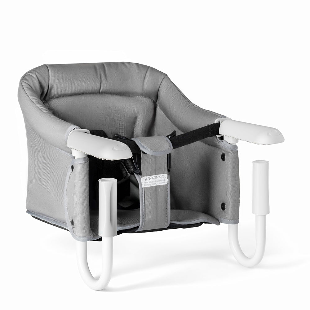 Pivvital hook-on high chair clip-on assembly demonstrates secure setup for meals.
