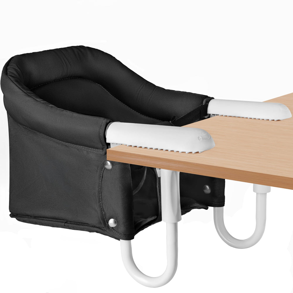 Pivvital hook-on high chair at table for family meals.