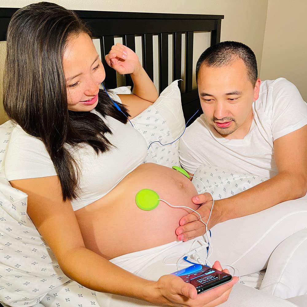 Pixie Tunes parents listening with bump headphones for fetal bonding and comfort