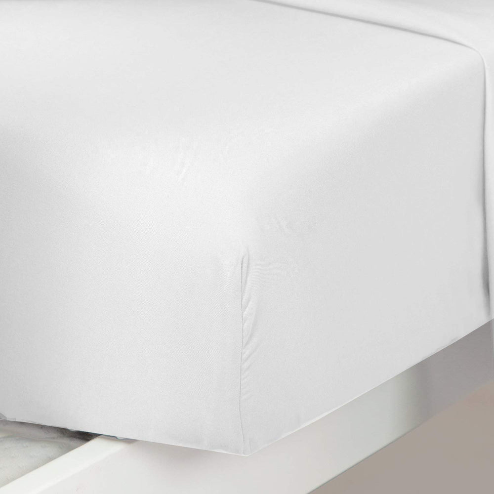 Plain Printed Linen fitted sheet demonstrates secure 8-inch pocket fit on standard toddler crib.