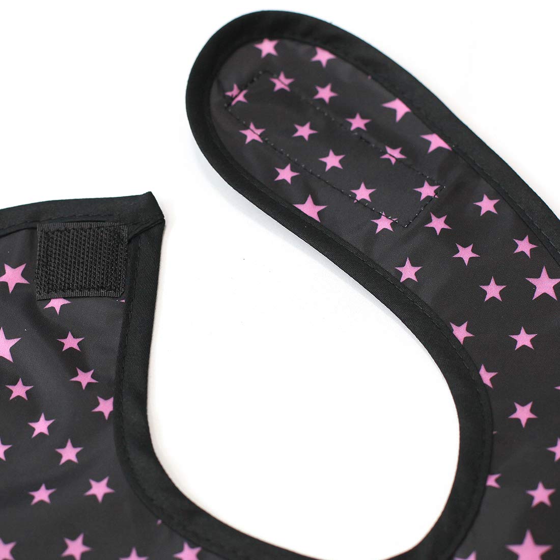 Plie full coverage bib pink star colorway adds cheerful style to mealtime