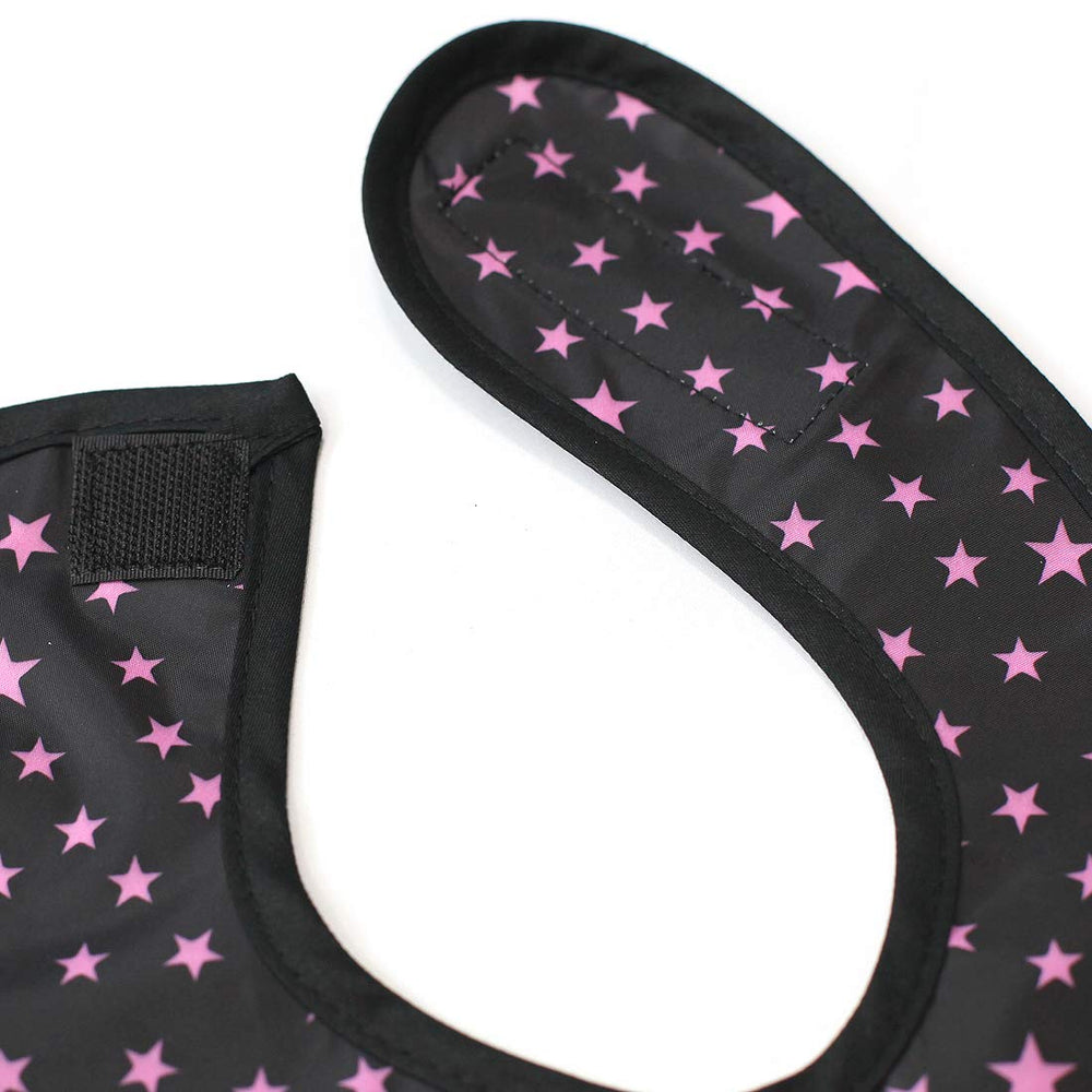 Plie full coverage bib pink star colorway adds cheerful style to mealtime