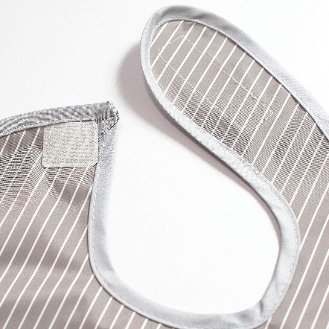Plie full-coverage bib with name tag helps prevent mix-ups and loss