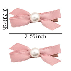 Pliwcas pearl embellished hair bow clip highlights delicate detail for events.