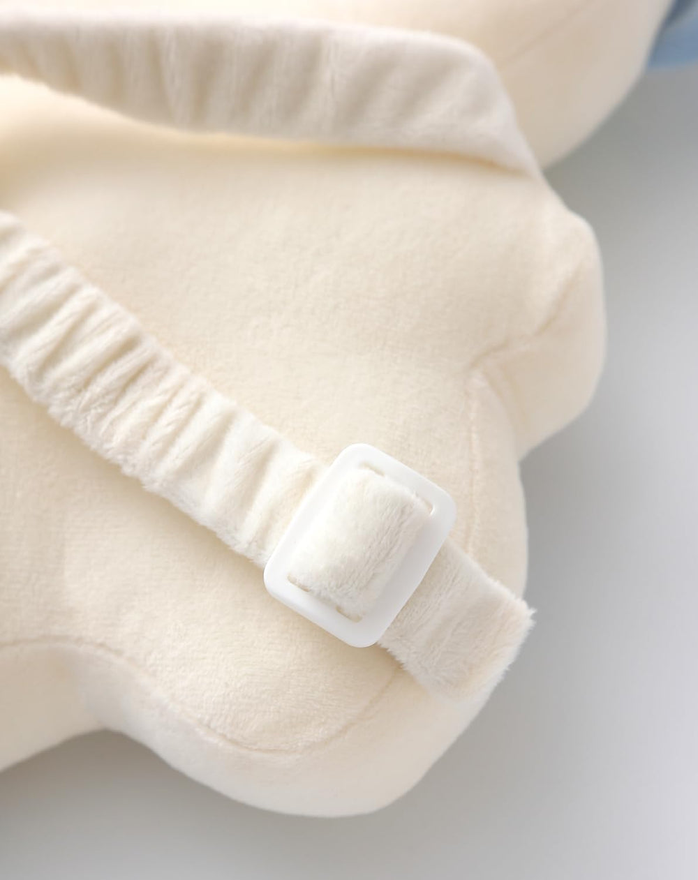 PLOVZ baby teething toy silicone white astronaut closeup for soothing teething.
