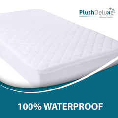 PlushDeluxe mini crib mattress protector breathable waterproof membrane keeps baby dry