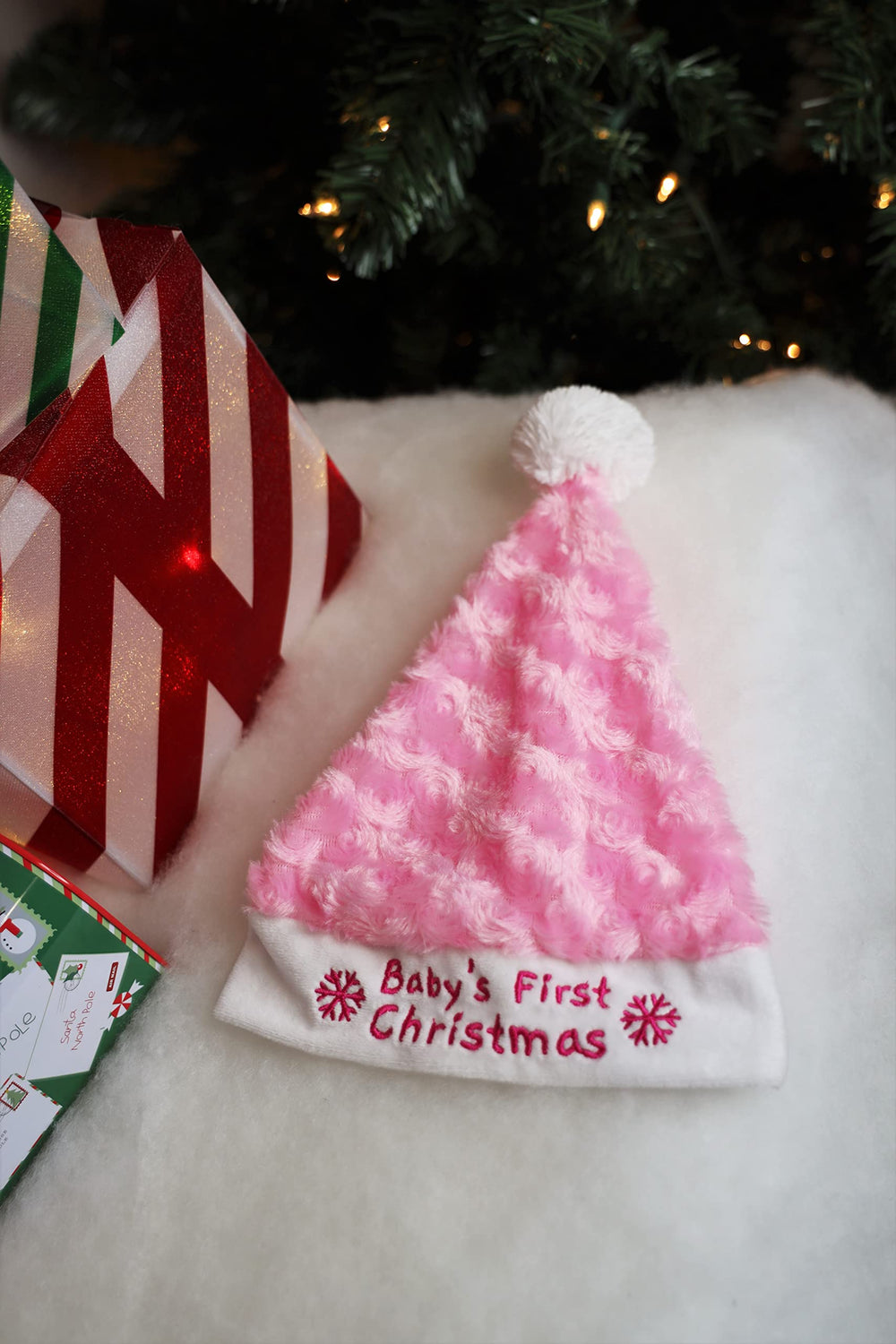PLUSHIBLE family Christmas photo setup with pink stocking