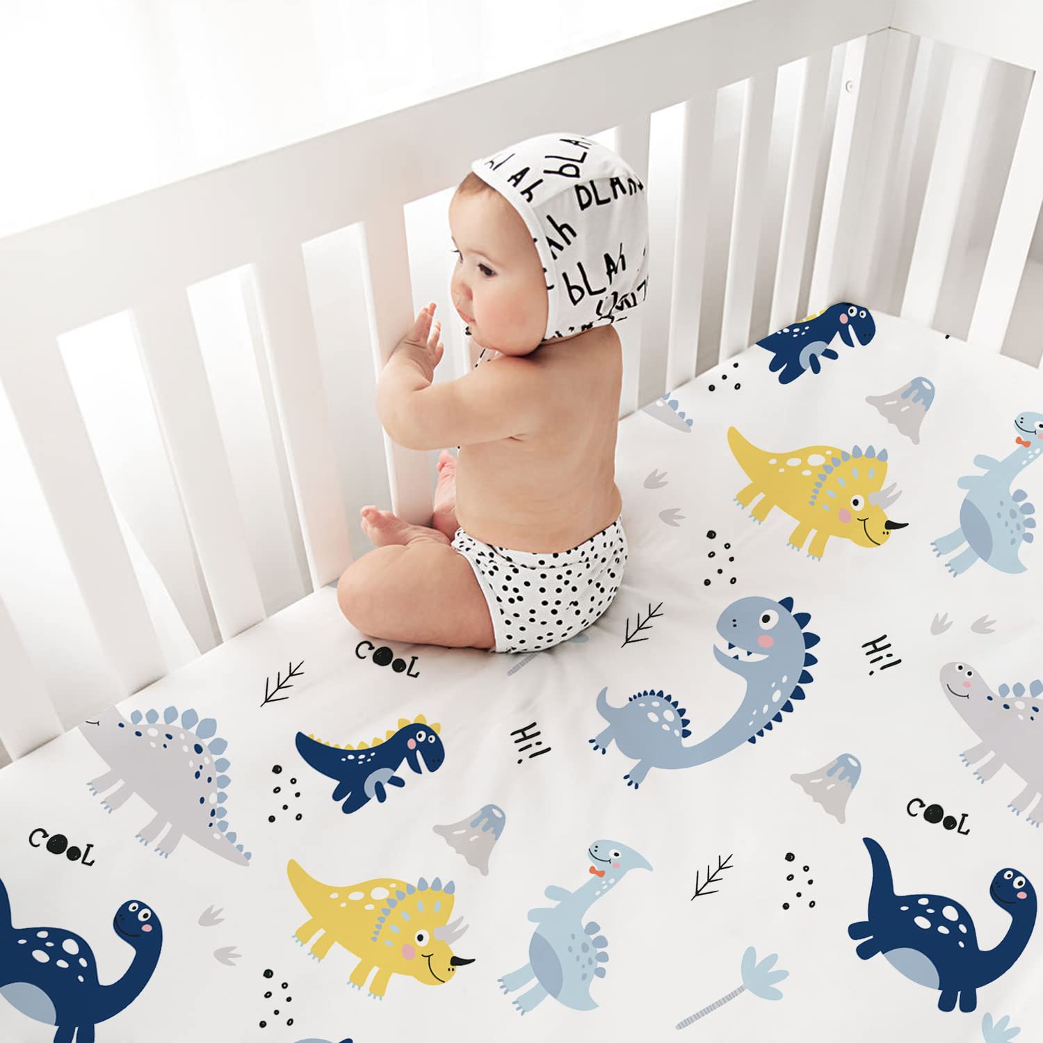 Plushii crib sheet with elephant pattern adds gentle texture for restful sleep.