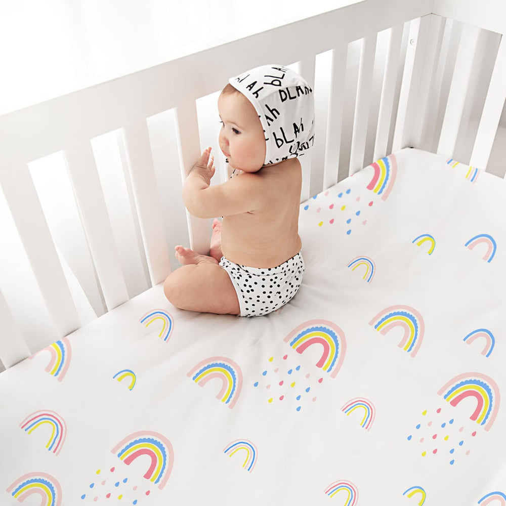 Plushii crib sheets elephants pattern offer calming colors and a cozy nursery vibe.