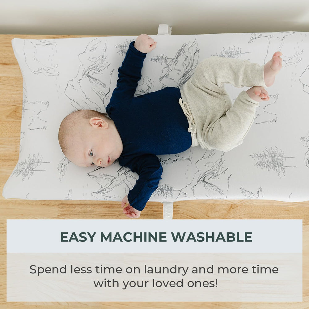 PobiBaby changing pad cover shows safety strap slits for secure use.