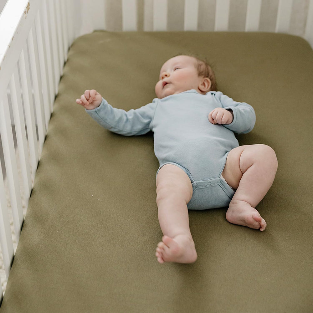 Pobibaby fabric closeup reveals 95% cotton, 5% spandex for lasting softness.