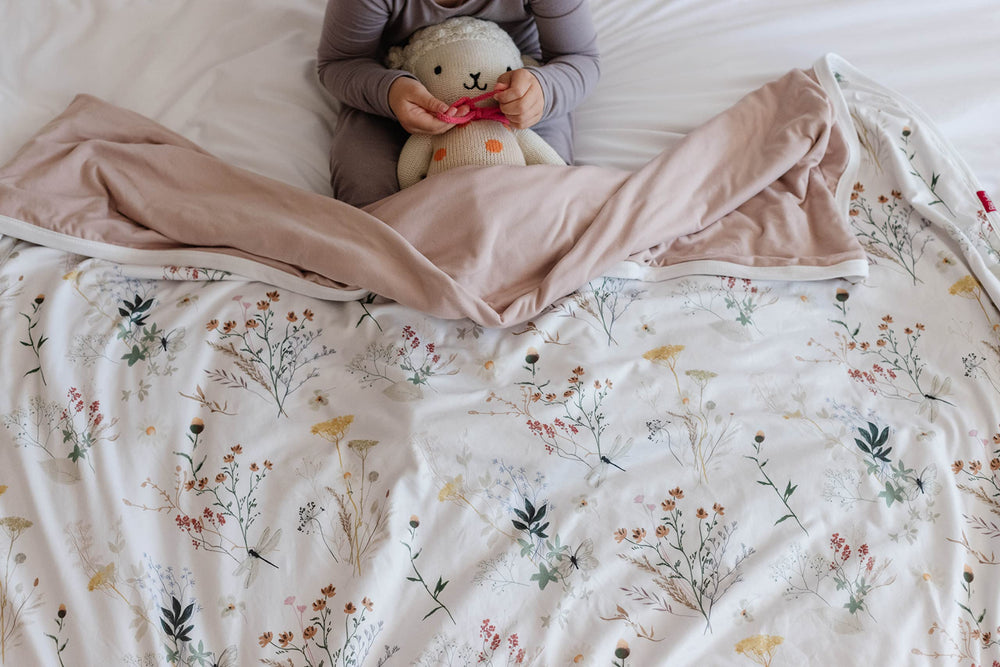 Pobibaby Wildflower blanket cotton/spandex blend offers durable warmth.