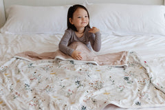 Pobibaby Wildflower blanket for nap time offers three-layer warmth for year round comfort.