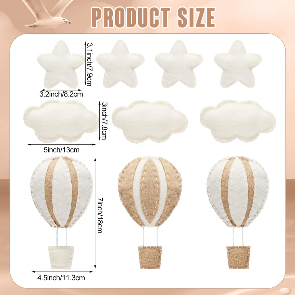 Poen cloud nursery wall decor features soft felt shapes for soothing look
