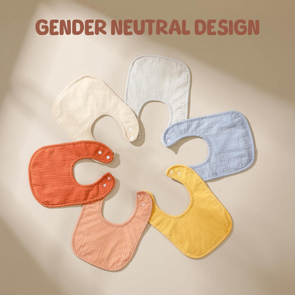 POIKSHARK wearing-bibs-playtime; orange bibs support meals and playtime.