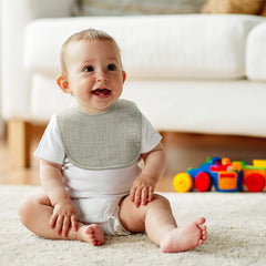 Poikshark adjustable snaps demonstrate size range from newborn to 36 months