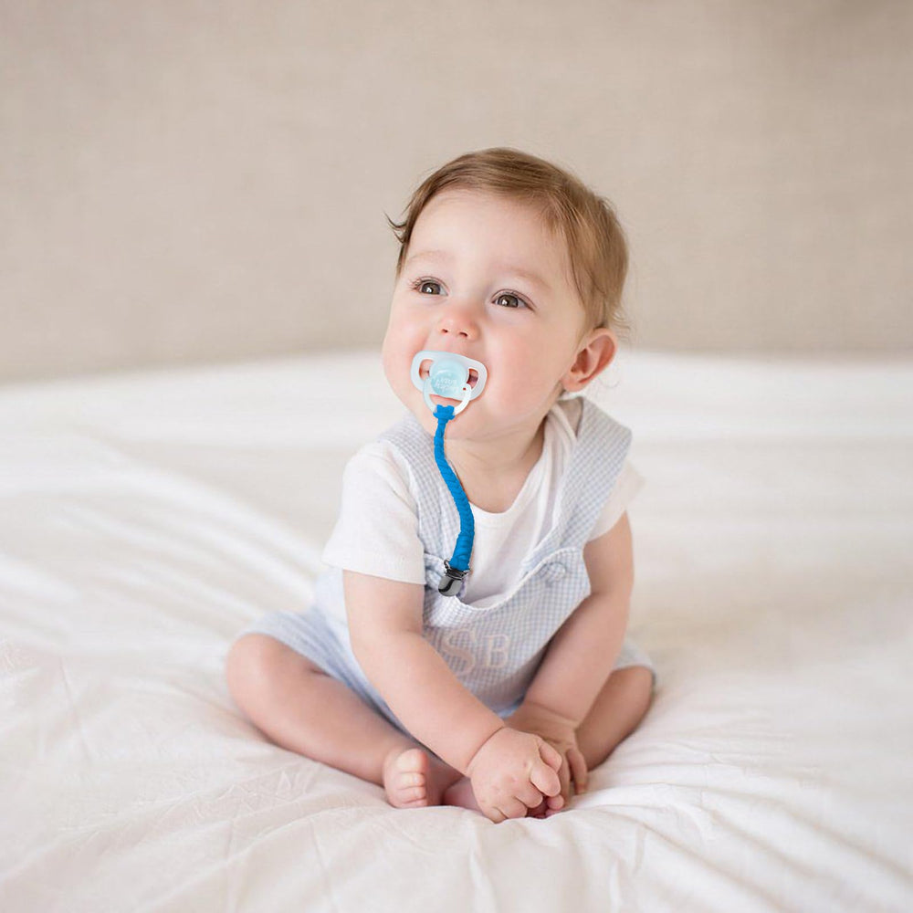 Pokipaw pacifier clip soft cotton braid keeps pacifiers gentle on skin.