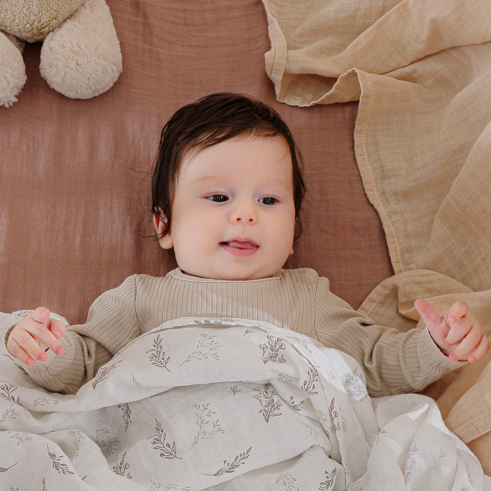 POMISO muslin swaddle blanket 47x47 size offers generous coverage for newborns and toddlers.