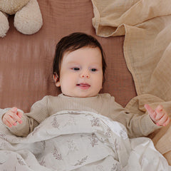 POMISO muslin swaddle blanket 47x47 size offers generous coverage for newborns and toddlers.