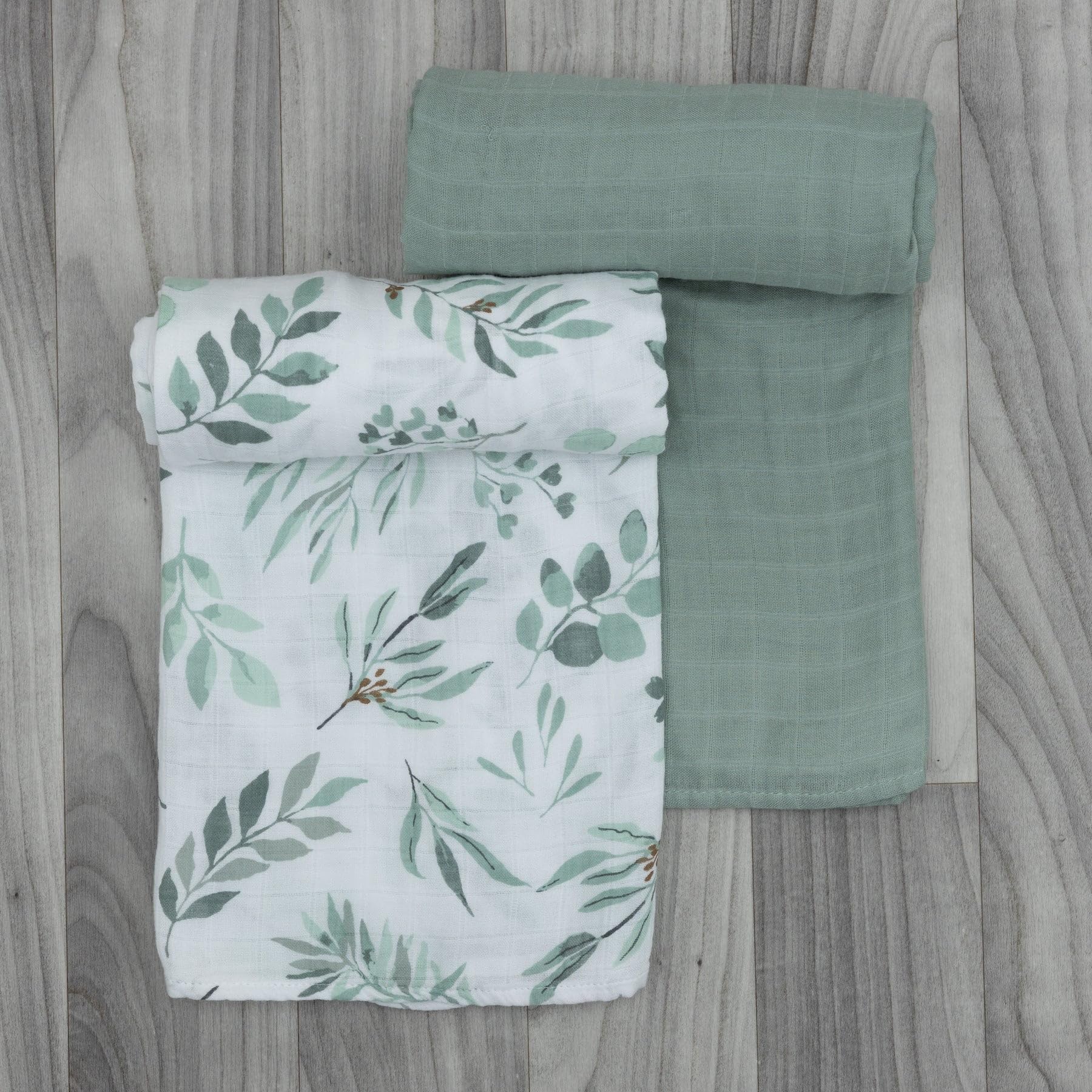 Pondering Pine muslin blanket 47x47 supports easy swaddling and stroller outings