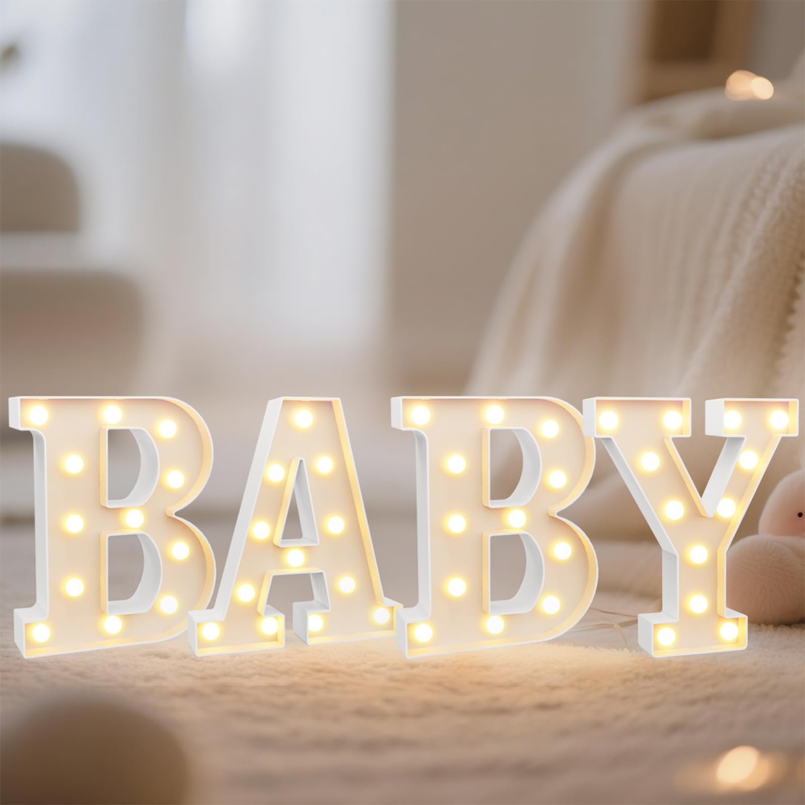 Pooqla BABY marquee birthday sign adds festive ambience